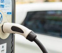 electric-car-in-charging-station-charging-an-elec-2025-01-08-14-31-19-utc